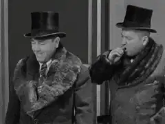 Laurel and Hardy top hat slapstick