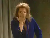 Jeff Bridges winking and blowing a kiss