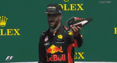 Max Verstappen drinks champagne from his shoe