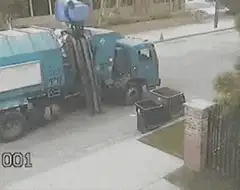 Garbage truck spills trash