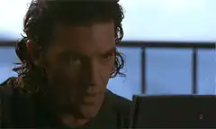 Antonio Banderas kissing his knuckles