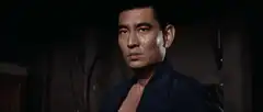 Tatsuya Nakadai removes robe with sword