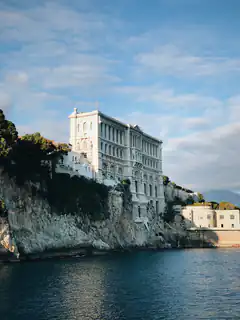 White palace on cliff by sea