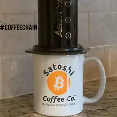 Satoshi Coffee Co. mug with AeroPress