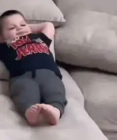 Baby relaxing on couch