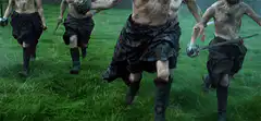 Scottish warriors running into battle