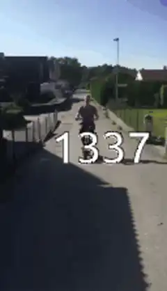 Guy on scooter does the 1337 hand gesture