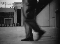 Low angle shot of soldier walking in prison yard
