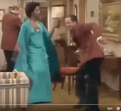 Elaine and Newman dancing