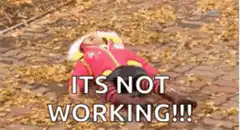 Child lying in leaves saying its not working