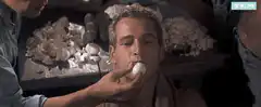 Paul Newman eating an egg