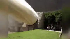Giant inflatable phallus at dam