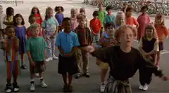 Buddy the Elf dancing with kids