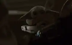 Grogu puts on his helmet