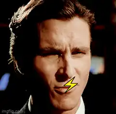 Christian Bale squinting with lightning bolt