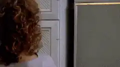 Woman opens fridge and sees a portal