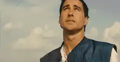 Luke Wilson looking up and snapping fingers