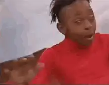 Man in red shirt dabbing