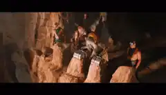 Waterfall crashes on army
