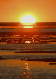 sunset over water