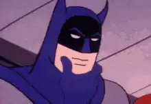 Batman thinking with hand on chin