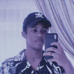 man in adidas cap taking mirror selfie