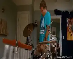 Drummer hits cymbal with foot