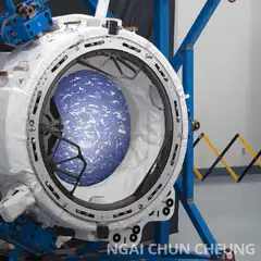 Pink heart drawn over Earth in space module