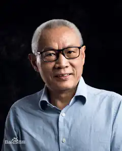Man with glasses smiling