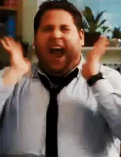 Jonah Hill screaming with hands up