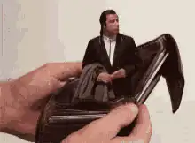 Tiny man in empty wallet