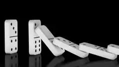 Dominoes falling in a chain reaction