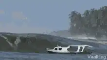 Boat hit by giant wave