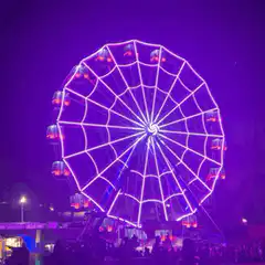 Ferris wheel spinning at night