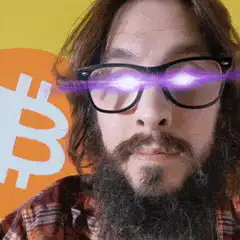 Bearded man with glowing eyes and bitcoin