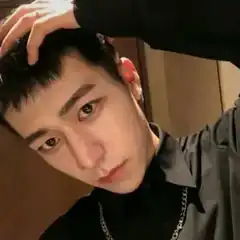 Man touching his hair selfie