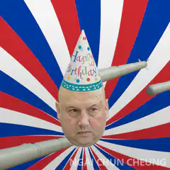 Bald man with birthday hat and missiles