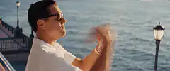 Leonardo DiCaprio throwing money