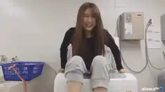 woman shaking on washing machine