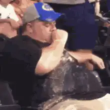 Man spitting out drink in shock