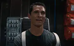 Matthew McConaughey smiling and making a face