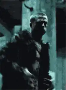 The Rock flexing muscles