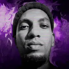 Man with beanie and purple smoke
