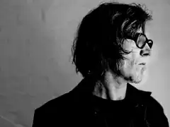 Man with glasses in black and white