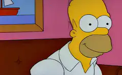 Homer Simpson excitedly raises his arms