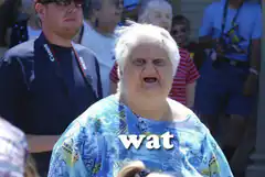 Older woman with shocked expression saying wat