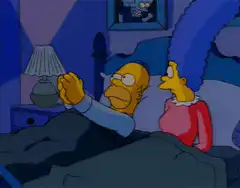 Homer and Marge in bed praying