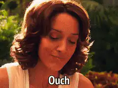 Woman says Ouch and looks up
