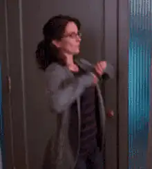 Woman dancing in doorway