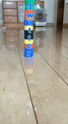 Twitter bottle cap tower falls over